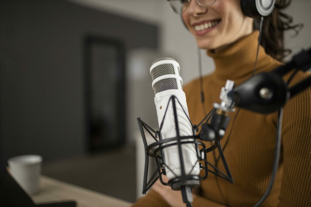 https://www.freepik.com/free-photo/woman-broadcasting-radio-while-smiling_11797790.htm#page=1&query=podcast&position=4